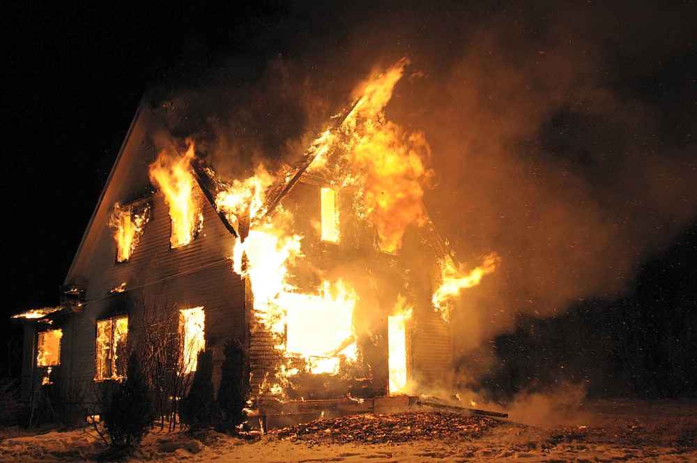 The abandoned farmhouse in Kipling, Sask., where Peter Whitmore held his kidnapping victims in 2006 was set ablaze during filming of a movie in 2009. (Gil Segovia / Digital Noise Photography)