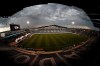 As viewed through a fisheye lens, storm clouds build over the stadium before an MLS soccer match between the New England Revolution and the Colorado Rapids on Thursday, July 4, 2019, in Commerce City, Colo. (AP Photo/David Zalubowski)