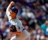 Los Angeles Dodgers starting pitcher Kenta Maeda works against the Colorado Rockies in the first inning of a baseball game Friday, April 5, 2019, in Denver. (AP Photo/David Zalubowski)