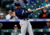 Milwaukee Brewers' Ryan Braun breaks his bat on his RBI-single off Colorado Rockies starting pitcher Antonio Senzatela in the first inning of a baseball game Friday, Sept. 27, 2019, in Denver. (AP Photo/David Zalubowski)