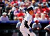 Colorado Rockies' Nolan Arenado follows the flight of his solo home run off St. Louis Cardinals starting pitcher Miles Mikolas in the third inning of a baseball game Thursday, Sept. 12, 2019, in Denver. (AP Photo/David Zalubowski)