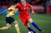 United States defender Emily Sonnett, front, picks up the ball as Australia forward Lisa De Vanna covers during the first half of a friendly soccer match Thursday, April 4, 2019, in Commerce City, Colo. (AP Photo/David Zalubowski)