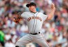 San Francisco Giants relief pitcher Derek Holland works against the Colorado Rockies in the fifth inning of a baseball game Wednesday, July 17, 2019, in Denver. (AP Photo/David Zalubowski)