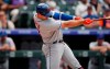 New York Mets' Pete Alonso connects for a solo home run off Colorado Rockies starting pitcher Jeff Hoffman in the sixth inning of a baseball game Wednesday, Sept. 18, 2019, in Denver. (AP Photo/David Zalubowski)