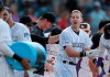 Colorado Rockies' Ryan McMahon, right, reacts after being doused with water by Ian Desmond after crossing home plate following his two-run walkoff home run off Atlanta Braves relief pitcher Jerry Blevins in the ninth inning of a baseball game Monday, Aug. 26, 2019, in Denver. (AP Photo/David Zalubowski)