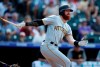 Pittsburgh Pirates' Colin Moran follows the flight of his RBI-single off Colorado Rockies relief pitcher Jairo Diaz in the ninth inning of a baseball game Sunday, Sept. 1, 2019, in Denver. Pittsburgh won 6-2. (AP Photo/David Zalubowski)