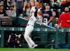 Colorado Rockies third baseman Nolan Arenado pulls in a pop foul by Atlanta Braves' Josh Donaldson for the final out in the top of the ninth inning of a baseball game Tuesday, April 9, 2019, in Denver. The Braves won 7-1. (AP Photo/David Zalubowski)