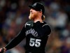 Colorado Rockies starting pitcher Jon Gray reacts after striking out Los Angeles Dodgers' Max Muncy to end the top of the eighth inning of a baseball game Monday, July 29, 2019, in Denver. (AP Photo/David Zalubowski)