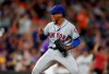 New York Mets starting pitcher Marcus Stroman reacts after catcher Wilson Ramos threw out Colorado Rockies' Charlie Blackmon, who tried to steal second base during the seventh inning of a baseball game Tuesday, Sept. 17, 2019, in Denver. (AP Photo/David Zalubowski)