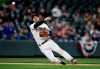 Colorado Rockies third baseman Nolan Arenado throws to first base to put out Los Angeles Dodgers' Dennis Santana in the eighth inning of a baseball game Sunday, April 7, 2019, in Denver. (AP Photo/David Zalubowski)