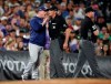 From left, San Diego Padres manager Andy Green argues with umpire Paul Nauert after Green was ejected by third base umpire Carlos Torres during the fifth inning of the team's baseball game against the Colorado Rockies on Saturday, Sept. 14, 2019, in Denver. (AP Photo/David Zalubowski)