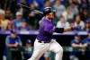 Colorado Rockies' Chris Iannetta watches his single off Los Angeles Dodgers' Tony Gonsolin during the ninth inning of a baseball game Tuesday, July 30, 2019, in Denver. The Dodgers won 9-4. (AP Photo/David Zalubowski)