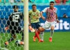Colombia's Gustavo Cuellar, center, watches the ball after he kicked to score his side's first goal against Paraguay during a Copa America Group B soccer match at Arena Fonte Nova in Salvador, Brazil, Sunday, June 23, 2019. (AP Photo/Ricardo Mazalan)