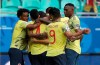 Colombia soccer players celebrate Gustavo Cuellar's goal against Paraguay during a Copa America Group B soccer match at the Arena Fonte Nova in Salvador, Brazil, Sunday, June 23, 2019. (AP Photo/Ricardo Mazalan)