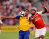 Colorado Rapids forward Niki Jackson (12) and Arsenal forward Tyreece John-Jules go after the ball during the first half of an international friendly soccer match, Monday, July 15, 2019, in Commerce City, Colo. (AP Photo/Jack Dempsey)