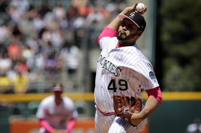 Colorado Rockies starting pitcher Antonio Senzatela throws against the San Diego Padres in the first inning of a baseball game in Denver, Sunday, May 12, 2019. (AP Photo/Joe Mahoney)