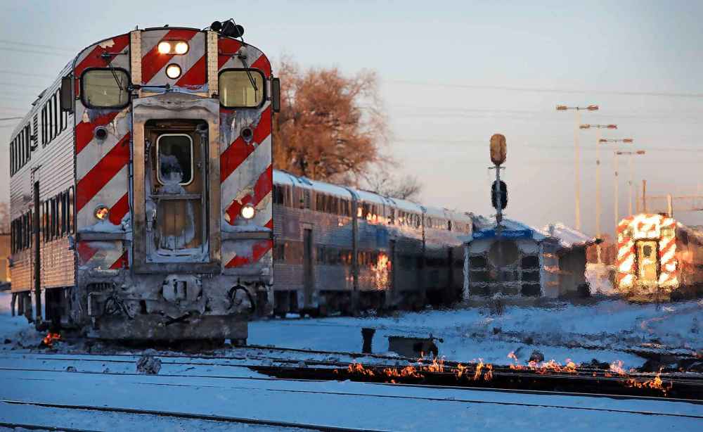 Stacey Wescott/Chicago Tribune/TNS
Chicago Metra trains operate in cold temperatures on Tuesday. The tracks are heated with gas-fired switch heaters that help prevent switching problems in extreme weather.