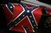 Danny Johnston / The Associated Press
Small Confederate flags are displayed on a shelf at Arkansas Flag and Banner in Little Rock, Ark., Tuesday. Major retailers including Amazon, Sears, eBay and Etsy and Wal-Mart Stores Inc., are halting sales of the Confederate flag and related merchandise.