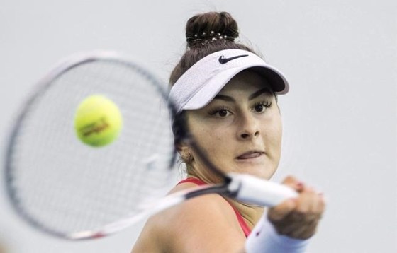 Bianca Andreescu of Canada returns to Lesia Tsurenko of Ukraine during their Fed Cup tennis match in Montreal, Saturday, April 21, 2018. Canadian teen Bianca Andreescu has recorded her second stunning tennis upset in as many days. THE CANADIAN PRESS/Graham Hughes