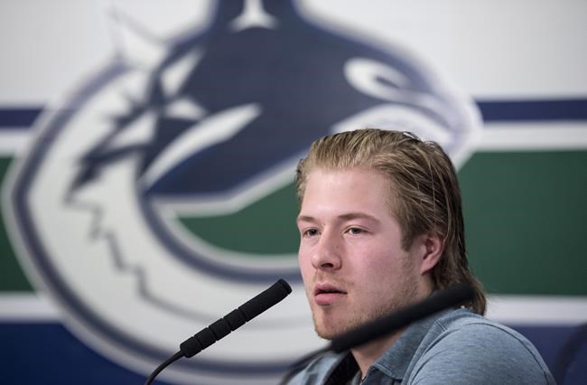 Vancouver Canucks' Brock Boeser is seen during a news conference at Rogers Arena in Vancouver on Monday, April 8, 2019. Vancouver Canucks general manager Jim Benning says no one wants Boeser at training camp more than he does. THE CANADIAN PRESS/Jonathan Hayward