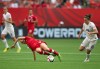 Canada's Lauren Sesselmann, left, misplays the ball as England's Jodie Taylor (19) gets ready to move towards the Canadian goal during first half FIFA Women's World Cup quarter-final soccer action in Vancouver, B.C., on Saturday June 27, 2015. Lauren Sesselmann collected a pass from a teammate early in the first half on Saturday, a play the Canadian defender has made countless times. On this occasion, however, in front of more than 54,000 fans, the ball got caught up in her feet. She fell to the ground and tried desperately to recover, but it was too late. THE CANADIAN PRESS/Darryl Dyck