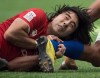 Canada's Nathan Hirayama tackles Samoa's Silao Nonu during World Rugby Sevens Series action, in Vancouver, B.C., on March 11, 2018. The Canadian men's rugby sevens team looks to join Canada's women this weekend in booking its ticket to the 2020 Olympics. THE CANADIAN PRESS/Jonathan Hayward