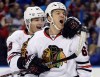 Chicago Blackhawks' Andrew Shaw, right, is congratulated by teammate Patrick Kane after scoring during NHL hockey first-round Stanley Cup playoff action against the St. Louis Blues, Friday, April 15, 2016, in St. Louis. The Montreal Canadiens added forward Andrew Shaw in a draft-day deal with the Chicago Blackhawks. THE CANADIAN PRESS/AP, Jeff Roberson