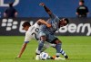 Montreal Impact midfielder Shamit Shome (28) gets tangled up with New York City FC midfielder Kwame Awuah during the second half of an MLS soccer match Wednesday, July 11, 2018, in New York. Hamilton's Forge FC has signed former New York City FC first-rounder Awuah to a multi-year contract. THE CANADIAN PRESS/AP/Julie Jacobson