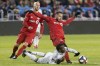 Toronto FC midfielder Nick DeLeon (18) battles for the ball with New England Revolution midfielder Luis Caicedo (27) during first half MLS soccer action in Toronto on Sunday, March 17, 2019. DeLeon was one of several Toronto FC players to take their kids onto the field last Saturday for the anthems before facing the Chicago Fire. It was an emotional first for DeLeon, who spent the first seven years of his MLS career at D.C. United before joining Toronto in December. DeLeon has found a new home in Toronto, which is only too happy to have him. THE CANADIAN PRESS/Chris Young