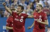 Toronto FC's Alejandro Pozuelo, right, celebrates with teammate Tsubasa Endoh after scoring during second half MLS soccer action against the Montreal Impact, in Montreal, Saturday, July 13, 2019. After a disappointing start to the season, a win in Montreal and strengthened roster have Toronto FC optimistic about the rest of the MLS campaign. A visit by the New York Red Bulls will test that theory Wednesday. THE CANADIAN PRESS/Graham Hughes