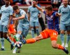 FC Cincinnati defender Nick Hagglund (14) deflects the ball off a shot on goal by Sporting Kansas City midfielder Kelyn Rowe (11) in the first half of an MLS soccer match, Sunday, April 7, 2019, in Cincinnati. Nick Hagglund spent five seasons with Toronto FC, won a championship and became a father in Canada. Now playing in his home town of Cincinnati, Hagglund returns to Toronto on Saturday night for the first time since being traded. THE CANADIAN PRESS/AP, John Minchillo