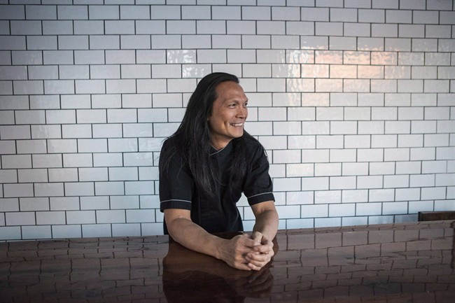 Chef Susur Lee is photographed in Toronto on December 16, 2013. The new Toronto restaurant Fring's has quickly become a hot spot since it opened last fall. And on Monday its status was set to further soar with an appearance from celebrity chef Bobby Flay. Restauranteur and celebrity chef Susur Lee says Flay will be a guest chef during a six-course tasting menu event involving local and exotic ingredients. THE CANADIAN PRESS/Chris Young