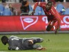 Canada's Zachary Brault-Guillard gets air as Dominica's Glenson Prince (1) makes a save during second half Concacaf Nations League qualifier soccer action in Toronto on Tuesday, October 16, 2018. The Montreal Impact have acquired Canadian international Zachary Brault-Guillard after reaching a loan agreement with France's Olympique Lyonnais for the 2019 season. THE CANADIAN PRESS/Nathan Denette