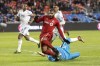 New England Revolution goalkeeper Brad Knighton (18) saves at the feet of Toronto FC forward Jordan Hamilton (7) during first half MLS soccer action in Toronto on March 17, 2019. A win over visiting New York City FC on Friday and Toronto FC can accomplish something it failed to do all of last season -- win three league games in a row. Toronto will be boosted in the attempt by the expected debut of Spanish attacker Alejandro Pozuelo. THE CANADIAN PRESS/Chris Young