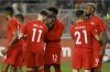 Canada defender Doneil Henry, centre left, celebrates with teammates midfielder Liam Millar (11) and midfielder Alphonso Davies (12) as he celebrates a goal during second half of CONCACAF Nations League play in Toronto on September 7, 2019. THE CANADIAN PRESS/Cole Burston