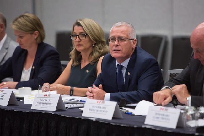 British Columbia Forestry Minister Doug Donaldson meets with federal and provincial ministers to discuss their response to the B.C wildfire in Vancouver, B.C., on Tuesday September 5, 2017. The detention of a top Huawei executive in Canada has derailed British Columbia's trade mission to China. THE CANADIAN PRESS/Ben Nelms