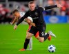 D.C. United forward Wayne Rooney (9) fights off New England Revolution defender Antonio Delamea Mlinar, left, to maintain control of the ball during an MLS soccer match, on Aug. 19, 2018, in Washington. D.C. Wayne Rooney is expected to draw a crowd in Vancouver this weekend, but the Whitecaps aren't letting the soccer superstar change their game plan. THE CANADIAN PRESS/AP,John McDonnell/The Washington Post