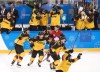 Canada defenceman Mat Robinson (37) looks on as Germany players celebrate after defeating Canada to advance to the gold medal game during third period men's semifinal Olympic hockey action at the 2018 Olympic Winter Games in Gangneung, South Korea on Friday, February 23, 2018. Sean Burke still can't bring himself to watch the game. Once was enough. The general manager of Canada's men's hockey team at the Pyeongchang Olympics has no interest in reliving the country's stunning 4-3 loss to Germany in the semifinals, a defeat that cost the group of non-NHLers a chance to play for gold. THE CANADIAN PRESS/Nathan Denette