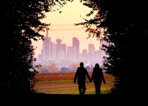A couple walks through a forest with the Frankfurt skyline in background near Frankfurt, Germany, Oct. 21, 2018. Development that's led to loss of habitat, climate change, overfishing, pollution and invasive species is causing a biodiversity crisis, scientists say in a new United Nations science report released Monday, May 6, 2019. THE CANADIAN PRESS/AP-Michael Probst