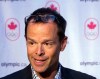 Jean-Luc Brassard speaks to the media after being named Canada's Chef de Mission for the 2016 Rio Olympics, in Montreal on Thursday Dec. 4, 2014. Brassars has stepped down with less than four months before the Games. He hinted he might quit earlier this year. THE CANADIAN PRESS/Ryan Remiorz