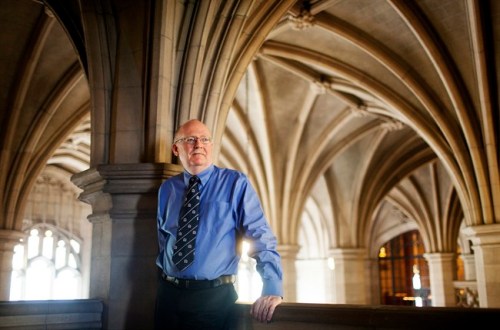 Rev. Dr. Stuart Macdonald, a professor of church and society at Knox College at the University of Toronto, poses for a photo in Toronto on Tuesday, May 7, 2013. Macdonald disputes the notion that Canada and the U.S. have always been vastly different in terms of religion and its impact on public policy, arguing the contrast is relatively recent and only truly took hold in the 1970s. THE CANADIAN PRESS/Michelle Siu