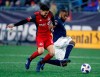 Toronto FC's Jonathan Osorio, left, and New England Revolution's Teal Bunbury battle for the ball during the first half of an MLS soccer game in Foxborough, Mass., Saturday, May 12, 2018. Toronto FC has had little joy on the road over the years in New England, with a 2-10-4 record there. But TFC looks to break that hoodoo this weekend, hoping to build on last week???s win over rival Montreal and climb back into the Eastern Conference playoff picture. THE CANADIAN PRESS/AP/Michael Dwyer