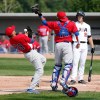 Puerto Rico third baseman Jeffry Dominguez, left, is unable to catch a pop foul hit by United States' Casey Kotchman, right, during baseball action at the Pan Am Games, in Ajax, Ont., on July 11, 2015. Kotchman, who signed a minor-league deal with the Blue Jays in the off-season, was in the city last summer as the first baseman for the United States national team at the Pan American Games. THE CANADIAN PRESS/AP, Julio Cortez
