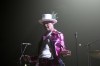 The Tragically Hip's Gord Downie, performs during the first stop of the Man Machine Poem Tour at the Save-On-Foods Memorial Centre in Victoria, B.C., on July 22, 2016. Gord Downie has always been a flamboyant showman. For the Tragically Hip's latest tour, he's wearing that style on his sleeve. Downie has been sporting a collection of brightly coloured metallic leather suits during the band's Man Machine Poem Tour, which kicked off in Victoria on Friday. THE CANADIAN PRESS/Chad Hipolito
