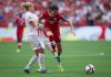 Canada's Christine Sinclair, right, leaps past a challenge from England's Steph Houghton during second half FIFA Women's World Cup quarter-final soccer action in Vancouver, B.C., on Saturday June 27, 2015. Canada takes on England in  an international soccer friendly in a rematch of the 2015 Women's World Cup quarterfinal won 2-1 by England.   THE CANADIAN PRESS/Darryl Dyck