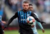 Montreal Impact defender Rudy Camacho, front, controls the ball in front of Sporting Kansas City forward Gerso, back, during the first half of an MLS soccer match in Kansas City, Kan., Saturday, March 30, 2019. After surviving the longest road trip in their franchise's history, Montreal Impact players are brimming with confidence ahead of their home opener. THE CANADIAN PRESS/AP/Orlin Wagner