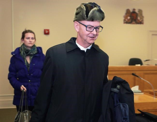 Lawyer Ches Crosbie arrives at the Supreme Court in St. John's on Novemeber 18, 2014. THE CANADIAN PRESS/Paul Daly