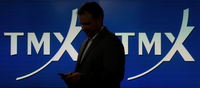 A man works in the TMX broadcast centre in Toronto, May 9, 2014. THE CANADIAN PRESS/Darren Calabrese