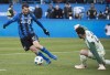 Montreal Impact's Ignacio Piatti moves in on Toronto FC's goalkeeper Alexander Bono during second half MLS soccer action in Montreal, Sunday, October 21, 2018. THE CANADIAN PRESS/Graham Hughes