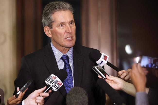 Manitoba Premier Brian Pallister speaks to media after the provincial budget was tabled in the Manitoba Legislature in Winnipeg, Tuesday, May 31, 2016. Pallister says changes being eyed by the federal government could cost the province a lot of aerospace jobs.THE CANADIAN PRESS/John Woods